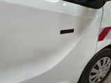 a white car with a red stripe on the side of it