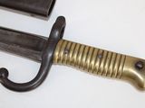 a knife that is laying on a table