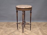 Sellette ou guéridon en acajou et placage d'acajou à décor d…