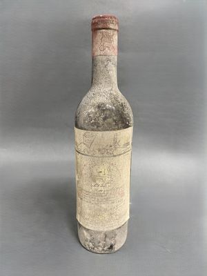 a bottle of wine that is sitting on a table