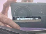 a person taking a picture of a camera with a cell phone