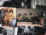 a bunch of pictures on the wall of a room