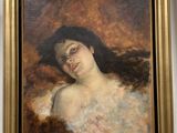 portrait d'une femme en manteau de fourrure, dans un cadre doré