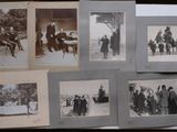 several old black and white photos of people in the snow