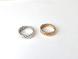 a couple of rings sitting on top of a white surface