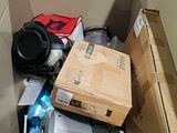 a cardboard box with a bunch of items inside of it