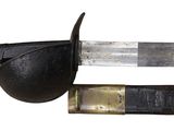 a close up of a knife with a black handle