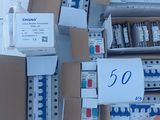 several boxes of electrical equipment are stacked on top of each other