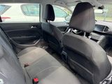 the back seats of a car are empty in a parking lot
