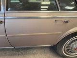 an image of a car that is parked in a garage