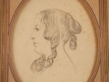 an old drawing of a woman with braids in her hair