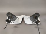 two lamps that are sitting on top of a table