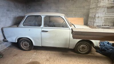 a small car that is parked in a garage