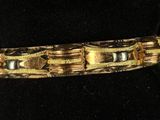 an image of a close up of a bracelet on a mannequin mannequin