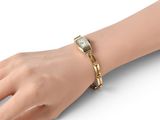 an image of a woman ' s hand with a watch on it ' s wrist