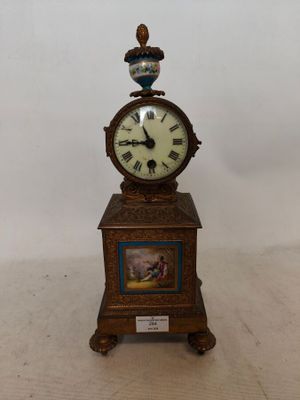 Pendule en bronze doré, le cadran émaillé à chiffres romains…