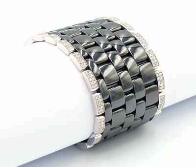 an image of a close up of a bracelet on a napkin