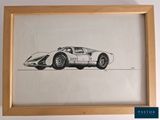 an image of a drawing of a sports car in a wooden frame