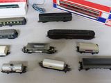 many different types of toy trains on the table
