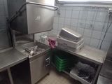 an image of a commercial kitchen with stainless steel appliances