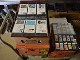 many boxes of stamps on a cart in a room