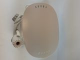 a white toilet with a white lid and a white tank