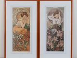 a pair of two framed art prints of a woman and a cat