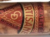 a close up of a bottle of liquor on a table
