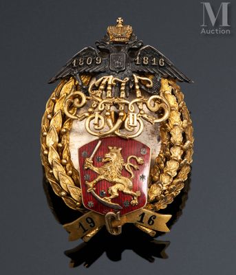 an image of a gold and red crest with a lion on it