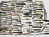 a lot of different types of knives on the table