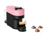 an image of a pink and black coffee maker next to a cup of coffee