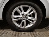 a close up of a car tire on the floor