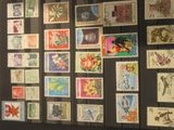 a display of stamps on a wall in a room