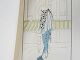 a drawing of a woman in a dress on a book