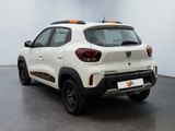 the rear end of a white car parked in a room