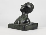 an image of a sculpture of a woman ' s head on a base