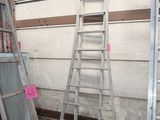several ladders are lined up against a wall in a room