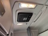 a picture of the inside of a vehicle with the sun shining through the window