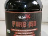 a close up of a jar of pure io powder on a table