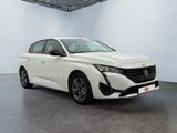 a white car is parked in a white room with a black floor