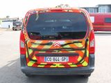 a van that has been painted to look like a fire truck