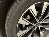 a close up view of a tire on a car