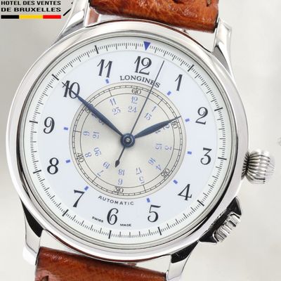 an image of a watch with a white dial and brown leather strap