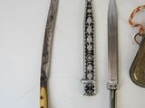 three different types of knives on the table