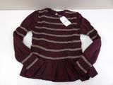 purple striped top with ruffles and lace detail