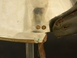 a close up of a helmet on a metal pole