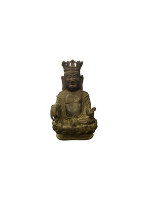 statue of a seated buddha with a crown on his head