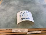 a close up of a stack of boxes on a table in a warehouse