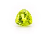 a trillion shaped green peridot gems on a white background