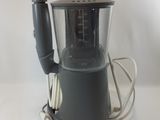 a blender with a blender on it sitting on a table